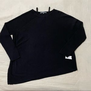 Elliot Lauren Size M. Asymmetrical black sweater with sweet details!